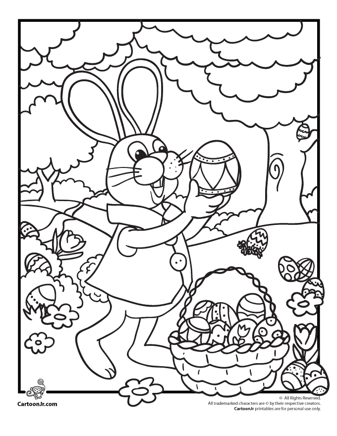 Peter Cottontail with an Easter basket and eggs in a pretty park
